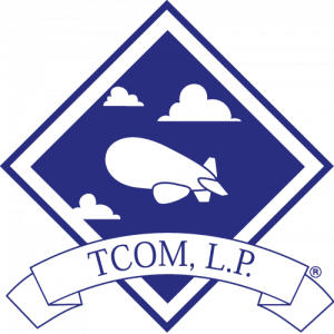 TCOM Logo in blue